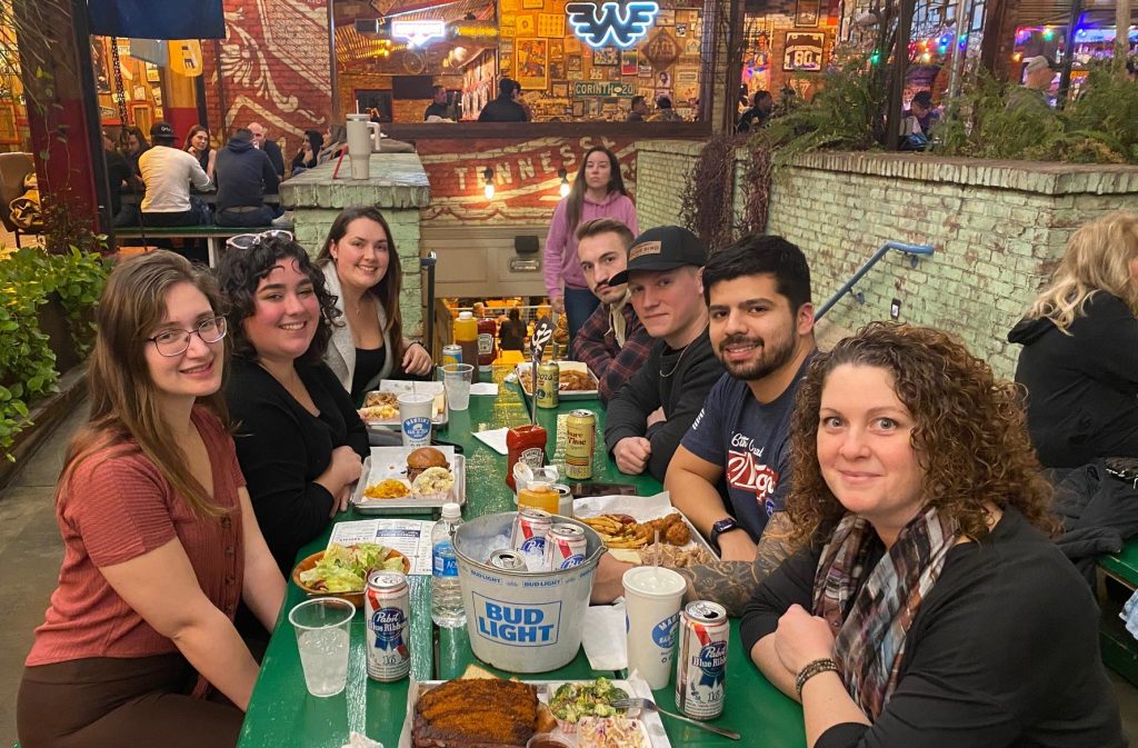 Members of UConn's VSO (Veteran Student Organization) leaders eating dinner together at the SVA (Student Veterans Of America) Conference January 2024